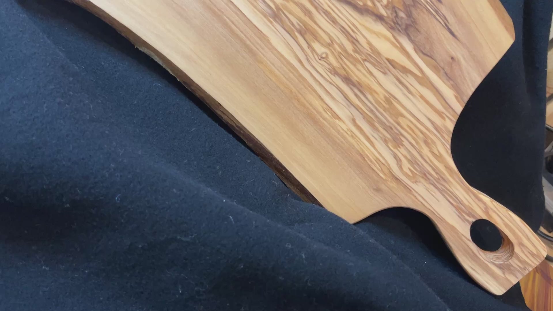 Video showing the grain, live edge, and natural character of The Olive Grove Gathering Board.